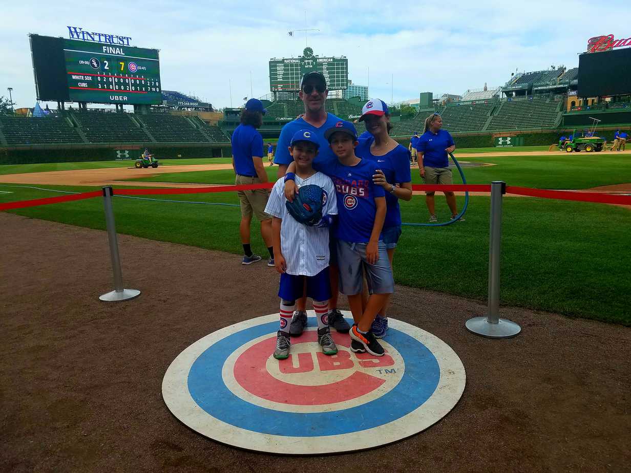 Wrigley Field Chicago Family Vacation Family Photo on Field